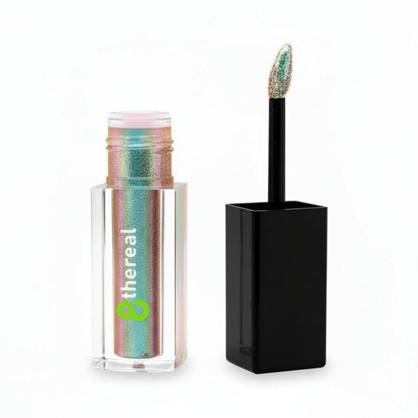 Liquid Shimmer with colorful packaging and black applicator on a white background