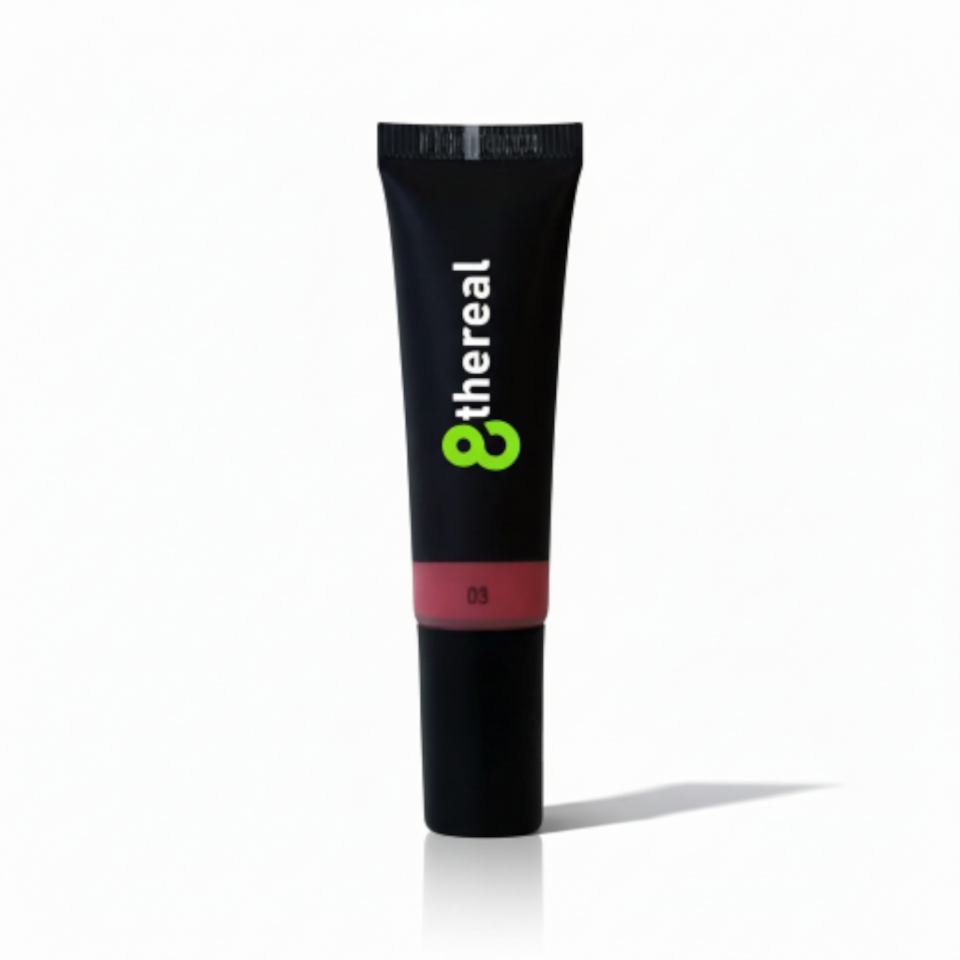Black cosmetic tube with '8thereal' branding on a white background