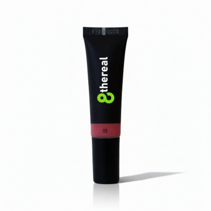 Black cosmetic tube with '8thereal' branding on a white background