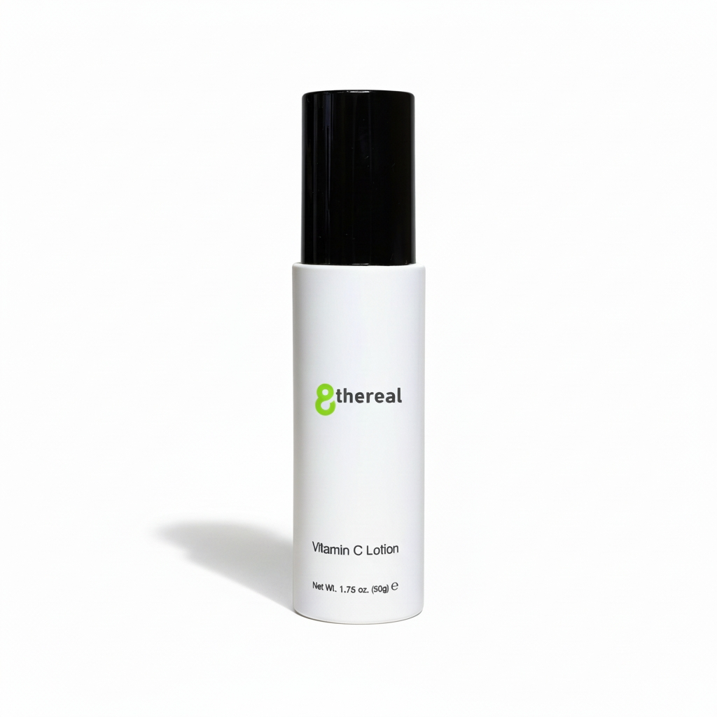 White lotion bottle with black cap on a white background